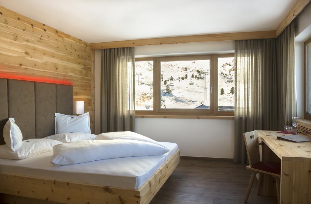 Passo Sella Dolomiti Mountain Resort Сельва-ді-Валь-Гардена Номер фото